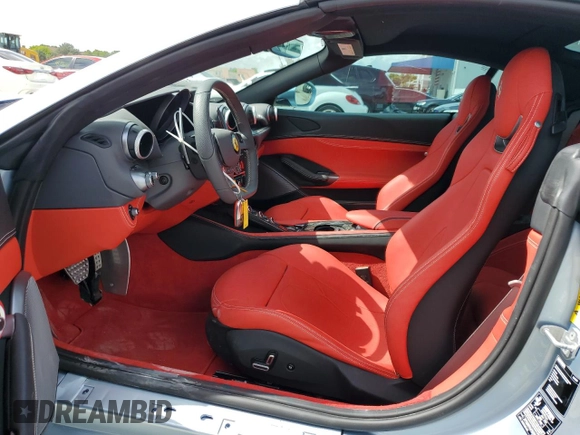 2023 Ferrari Portofino z VIN ZFF02RPA4P0298111, wystawiony jako Copart lot #65799704 z przebiegiem 1096 mil mil oraz Nie do naprawy. Historia ofert i sprzedaży dostępna na DreamBid. Obrazek 7.