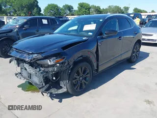 2021 Mazda CX-30 Premium with VIN 3MVDMBDYXMM307047, listed as a IAAI auction lot 41974966 with 53,409 mi miles and . Bid and sale history available at carsss.com. Image 20.