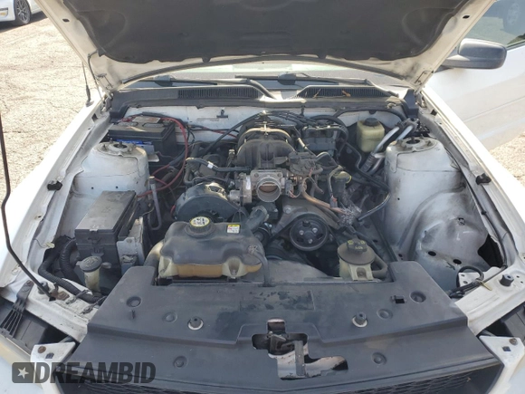 2007 Ford Mustang Deluxe z VIN 1ZVFT84NX75272930, wystawiony jako Copart lot #61072165 z przebiegiem 137 513 mil mil oraz Szkoda całkowita • Salvage title. Historia ofert i sprzedaży dostępna na DreamBid. Obrazek 11.