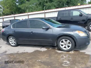2009 Nissan Altima 2.5 z VIN 1N4AL21E69N560192, wystawiony jako IAAI lot #42030783 z przebiegiem 179 859 mil mil oraz . Historia ofert i sprzedaży dostępna na DreamBid. Obrazek 13.