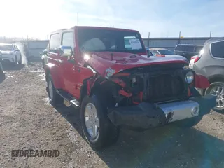 2011 Jeep Wrangler Sahara with VIN 1J4AA5D18BL561687, listed as a IAAI auction lot 41435436 with 76,284 mi miles and . Bid and sale history available at carsss.com. Image 1.
