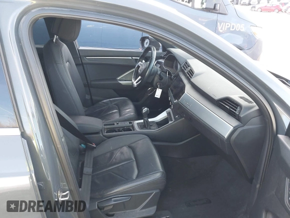 2019 Audi Q3 Premium with VIN WA1AECF34K1077065, listed as a IAAI auction lot 40826923 with 85,458 mi miles and . Bid and sale history available at DreamBid. Image 5.