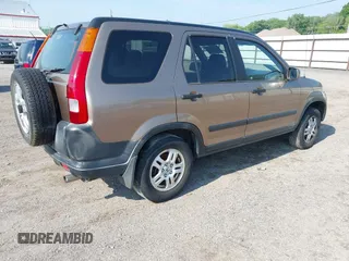2003 Honda CR-V EX z VIN JHLRD78843C039985, wystawiony jako IAAI lot #42410668 z przebiegiem 208 567 mil mil oraz . Historia ofert i sprzedaży dostępna na DreamBid. Obrazek 4.