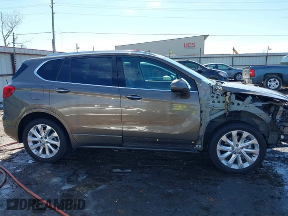2017 Buick Envision Premium I with VIN LRBFXESX9HD098476, listed as a IAAI auction lot 41615847 with 91,903 mi miles and . Bid and sale history available at DreamBid. Image 14.