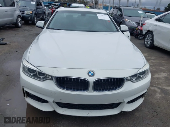 2015 BMW 4 Series 428i with VIN WBA3N7C58FK222925, listed as a IAAI auction lot 41776858 with 106,946 mi miles and . Bid and sale history available at carsss.com. Image 12.