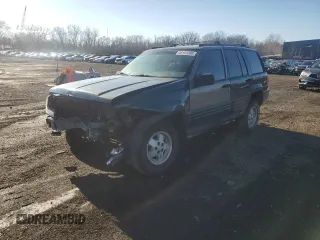 1998 Jeep Grand Cherokee Laredo with VIN 1J4GZ48S4WC239246, listed as a Copart auction lot 86101204 with 0 mi miles and Salvage Title. Bid and sale history available at carsss.com. Image 1.