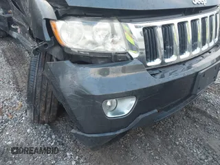2011 Jeep Grand Cherokee Laredo z VIN 1J4RR4GG2BC737140, wystawiony jako IAAI lot #41217587 z przebiegiem Nie podano mil oraz . Historia ofert i sprzedaży dostępna na DreamBid. Obrazek 20.