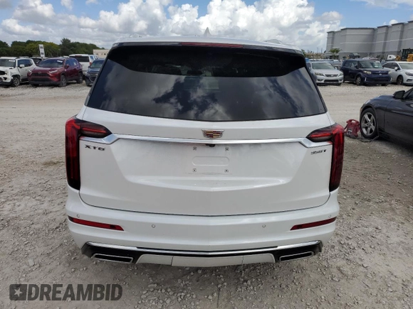 2024 Cadillac XT6 FWD Luxury with VIN 1GYKPAR4XRZ746989, listed as a Copart auction lot 77325614 with 2,234 mi miles and Salvage Title. Bid and sale history available at carsss.com. Image 6.