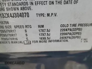 2004 Chevrolet Tahoe LT with VIN 1GNEC13ZX4J304070, listed as a Copart auction lot 59779655 with 123,241 mi miles and Salvage title. Bid and sale history available at DreamBid. Image 13.