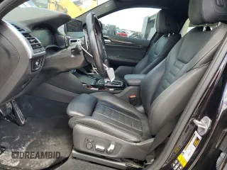 2022 BMW X4 M z VIN 5YM23EC06N9J91068, wystawiony jako Copart lot #60110194 z przebiegiem 25 358 mil mil oraz Szkoda całkowita • Salvage title. Historia ofert i sprzedaży dostępna na DreamBid. Obrazek 7.