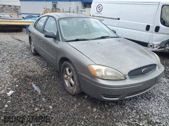 2004 Ford Taurus SE with VIN 1FAFP53274A193186, listed as a Copart auction lot 60255125 with 184,493 mi miles and Salvage title. Bid and sale history available at DreamBid. Image 4.