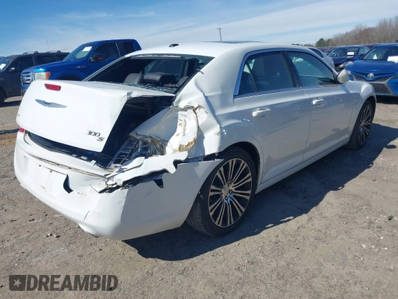 2013 Chrysler 300 with VIN 2C3CCABGXDH699096, listed as a IAAI auction lot 41614034 with 136,344 mi miles. Bid and sale history available at carsss.com. Image 4.