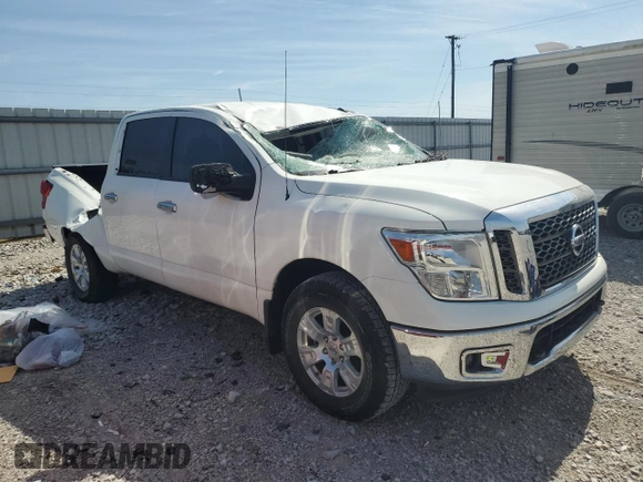 2018 Nissan Titan SV z VIN 1N6AA1EJ7JN542996, wystawiony jako Copart lot #50969835 z przebiegiem 89 664 mil mil oraz Szkoda całkowita • Salvage title. Historia ofert i sprzedaży dostępna na DreamBid. Obrazek 4.