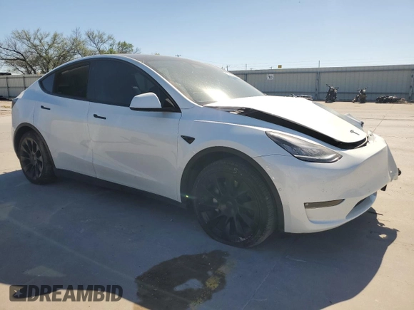 2022 Tesla Model Y Long Range with VIN 7SAYGAEE6NF506405, listed as a Copart auction lot 50392655 with 36,866 mi miles and Salvage Title. Bid and sale history available at DreamBid. Image 4.