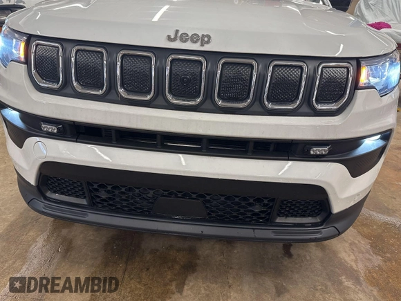 2022 Jeep Compass Latitude with VIN 3C4NJDBB1NT205930, listed as a IAAI auction lot 42801149 with 11,098 mi miles and . Bid and sale history available at DreamBid. Image 1.