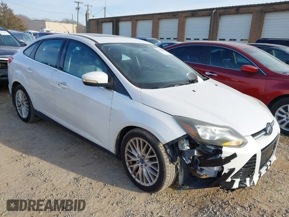 2013 Ford Focus Titanium with VIN 1FADP3J22DL167324, listed as a IAAI auction lot 41616927 with 127,259 mi miles and . Bid and sale history available at carsss.com. Image 1.