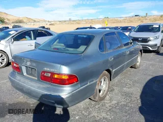 1998 Toyota Avalon XL with VIN 4T1BF18B3WU288614, listed as a IAAI auction lot 40632663 with 185,987 mi miles and . Bid and sale history available at DreamBid. Image 4.