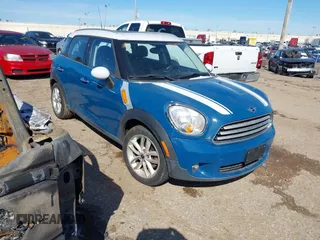 2012 MINI Countryman with VIN WMWZB3C56CWM02100, listed as a IAAI auction lot 41644342 with 166,045 mi miles and . Bid and sale history available at DreamBid. Image 1.