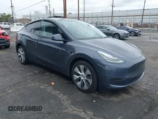 2023 Tesla Model Y Long Range with VIN 7SAYGDEE3PA152683, listed as a IAAI auction lot 41798988 with 14,063 mi miles and . Bid and sale history available at carsss.com. Image 1.