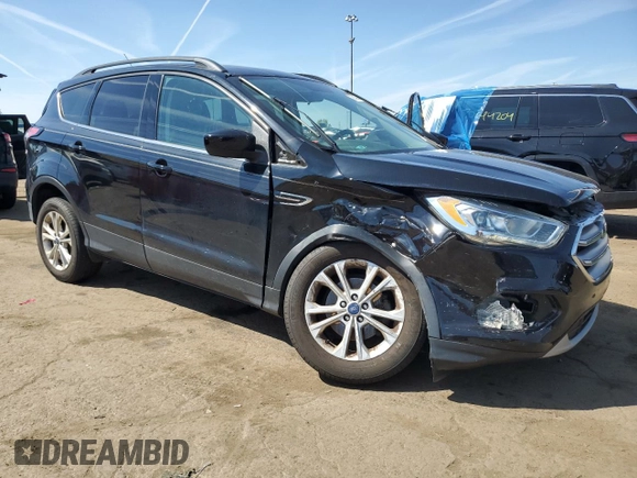 2017 Ford Escape SE z VIN 1FMCU0GD5HUD52467, wystawiony jako Copart lot #70616944 z przebiegiem 115 876 mil mil oraz Szkoda całkowita • Salvage title. Historia ofert i sprzedaży dostępna na DreamBid. Obrazek 4.