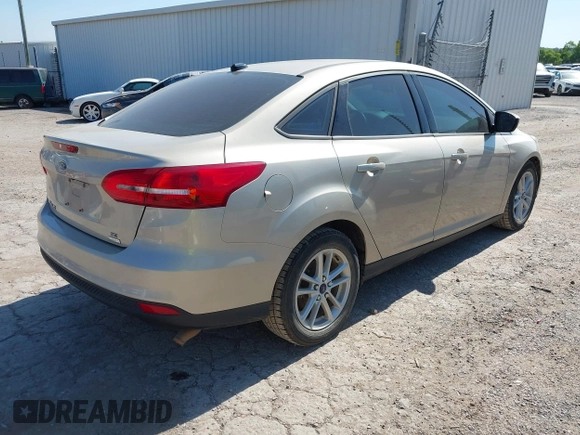 2018 Ford Focus SE z VIN 1FADP3FEXJL210905, wystawiony jako IAAI lot #42264105 z przebiegiem 136 499 mil mil oraz . Historia ofert i sprzedaży dostępna na DreamBid. Obrazek 4.