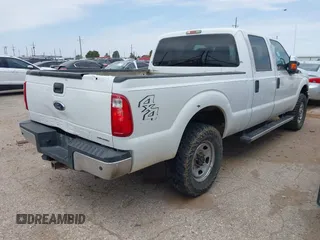 2014 Ford F-250 XL with VIN 1FT7W2B63EEA38018, listed as a IAAI auction lot 42029169 with 135,582 mi miles and . Bid and sale history available at DreamBid. Image 4.