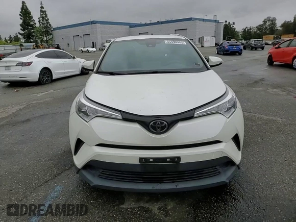 2019 Toyota C-HR XLE z VIN JTNKHMBX7K1028552, wystawiony jako Copart lot #55490905 z przebiegiem 127 397 mil mil oraz Szkoda całkowita • Salvage title. Historia ofert i sprzedaży dostępna na DreamBid. Obrazek 14.