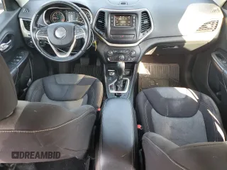 2014 Jeep Cherokee Latitude z VIN 1C4PJMCBXEW284645, wystawiony jako Copart lot #58838355 z przebiegiem 131 631 mil mil oraz Szkoda całkowita • Salvage title. Historia ofert i sprzedaży dostępna na DreamBid. Obrazek 8.