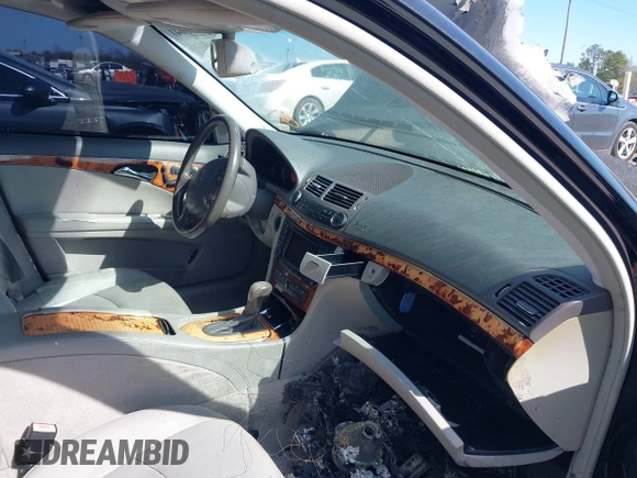 2005 Mercedes-Benz E-Class 3.2L with VIN WDBUF65J65A695704, listed as a IAAI auction lot 41618041 with 1 mi miles. Bid and sale history available at carsss.com. Image 5.