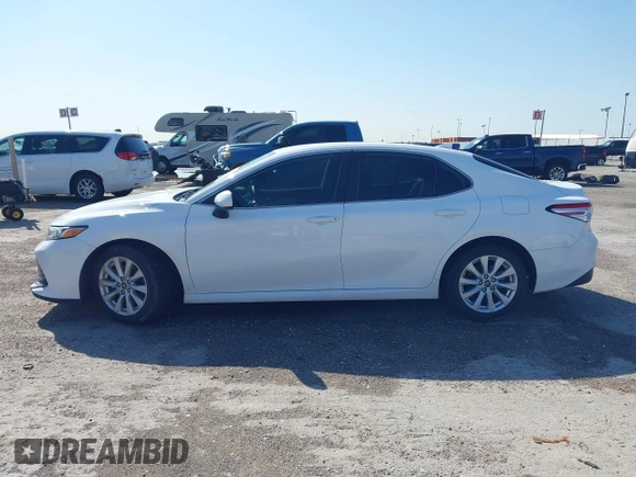 2019 Toyota Camry LE with VIN 4T1B11HK9KU825107, listed as a IAAI auction lot 41971159 with 15,802 mi miles and . Bid and sale history available at DreamBid. Image 14.
