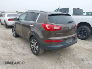 2011 Kia Sportage EX with VIN KNDPC3A23B7029574, listed as a IAAI auction lot 42168504 with 208,407 mi miles. Bid and sale history available at carsss.com. Image 3.