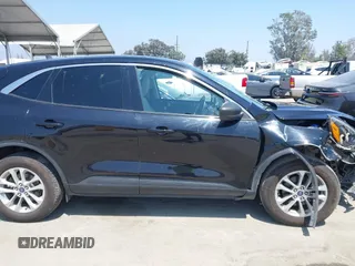 2022 Ford Escape SE z VIN 1FMCU9G68NUA10450, wystawiony jako IAAI lot #42481873 z przebiegiem 60 661 mil mil oraz . Historia ofert i sprzedaży dostępna na DreamBid. Obrazek 13.
