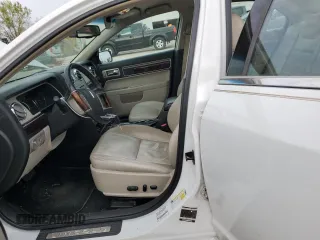 2007 Lincoln MKZ z VIN 3LNHM26T37R669681, wystawiony jako Copart lot #53042655 z przebiegiem 156 582 mil mil oraz Szkoda całkowita • Salvage title. Historia ofert i sprzedaży dostępna na DreamBid. Obrazek 7.