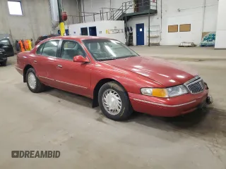 1997 Lincoln Continental with VIN 1LNLM97V9VY616128, listed as a Copart auction lot 48687805 with 61,591 mi miles and Salvage Title. Bid and sale history available at carsss.com. Image 4.