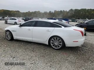 2013 Jaguar XJ with VIN SAJWA2GB8DLV52975, listed as a Copart auction lot 79123644 with 160,473 mi miles and Salvage Title. Bid and sale history available at carsss.com. Image 2.