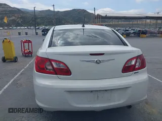 2007 Chrysler Sebring Touring with VIN 1C3LC56R07N536102, listed as a IAAI auction lot 41902390 with 203,037 mi miles and . Bid and sale history available at DreamBid. Image 16.