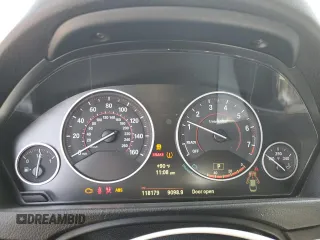 2014 BMW 4 Series 428i with VIN WBA3N7C58EF718718, listed as a Copart auction lot 60434345 with 118,179 mi miles and Salvage title. Bid and sale history available at DreamBid. Image 9.