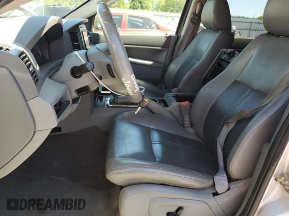 2005 Jeep Grand Cherokee Limited with VIN 1J4HR58295C671906, listed as a Copart auction lot 62916515 with 221,295 mi miles and Clean title. Bid and sale history available at DreamBid. Image 7.