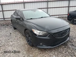 2014 Mazda 6 i Grand Touring with VIN JM1GJ1W69E1113895, listed as a IAAI auction lot 41953544 with 105,103 mi miles. Bid and sale history available at carsss.com. Image 1.