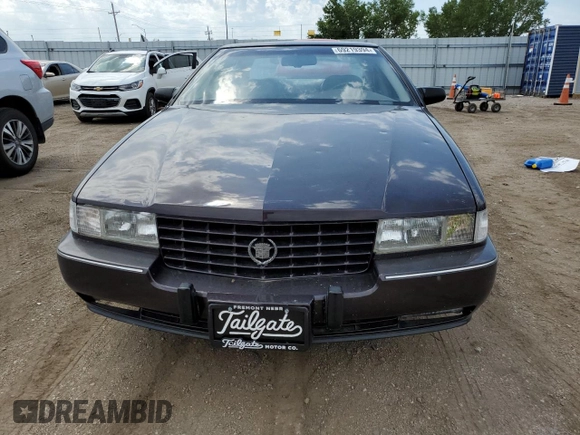 1992 Cadillac Seville z VIN 1G6KY53BXNU804126, wystawiony jako Copart lot #69219394 z przebiegiem 100 647 mil mil oraz Czysty tytuł • Clean title. Historia ofert i sprzedaży dostępna na DreamBid. Obrazek 5.