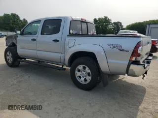 2009 Toyota Tacoma PreRunner with VIN 3TMJU62NX9M082642, listed as a Copart auction lot 57395705 with 160,365 mi miles and Salvage title. Bid and sale history available at DreamBid. Image 2.