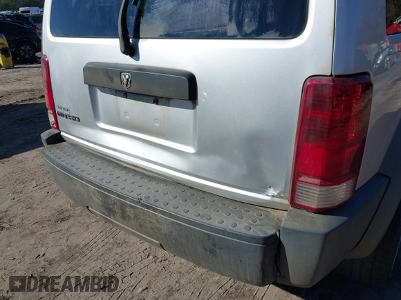2007 Dodge Nitro SXT with VIN 1D8GT28K97W642118, listed as a IAAI auction lot 41276172 with 385,441 mi miles. Bid and sale history available at carsss.com. Image 6.