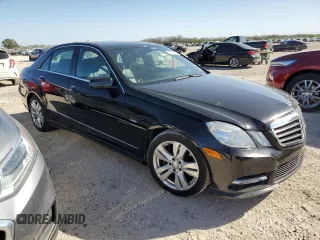 2012 Mercedes-Benz E 350 Luxury with VIN WDDHF2EB3CA596488, listed as a Copart auction lot 87231694 with 113,398 mi miles and Clean title. Bid and sale history available at DreamBid. Image 4.