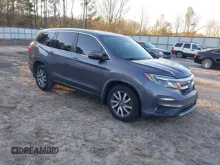 2019 Honda Pilot EX-L with VIN 5FNYF5H5XKB026513, listed as a IAAI auction lot 41269623 with 62,372 mi miles and . Bid and sale history available at carsss.com. Image 1.