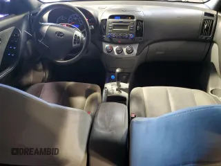 2009 Hyundai Elantra GLS with VIN KMHDU46DX9U787838, listed as a Copart auction lot 61500845 with 146,127 mi miles and Salvage title. Bid and sale history available at DreamBid. Image 8.