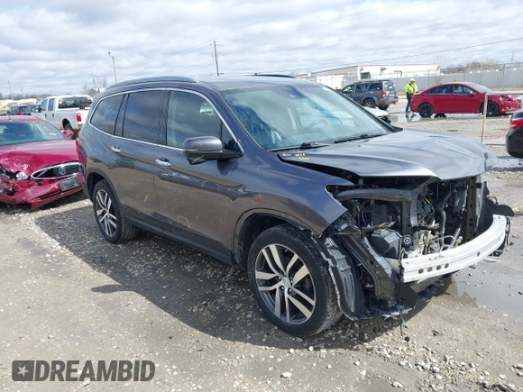 2017 Honda Pilot Touring with VIN 5FNYF6H92HB036406, listed as a IAAI auction lot 41949223 with 147,462 mi miles. Bid and sale history available at carsss.com. Image 1.