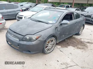 2006 Scion tC z VIN JTKDE177760091894, wystawiony jako IAAI lot #42465468 z przebiegiem 240 821 mil mil oraz . Historia ofert i sprzedaży dostępna na DreamBid. Obrazek 2.