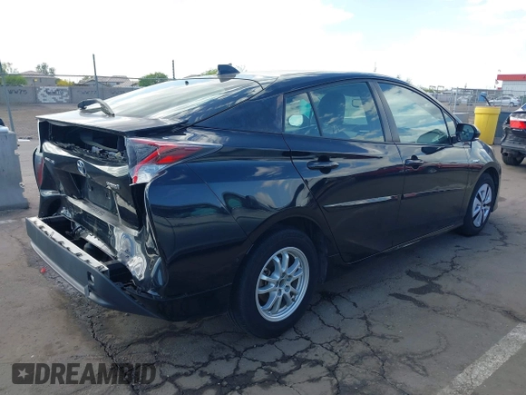 2017 Toyota Prius Two with VIN JTDKARFUXH3040763, listed as a IAAI auction lot 42041831 with 120,063 mi miles. Bid and sale history available at carsss.com. Image 4.