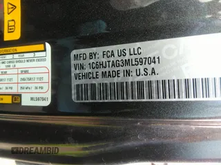 2021 Jeep Gladiator Sport S z VIN 1C6HJTAG3ML597041, wystawiony jako IAAI lot #41714640 z przebiegiem 46 402 mil mil oraz . Historia ofert i sprzedaży dostępna na DreamBid. Obrazek 9.
