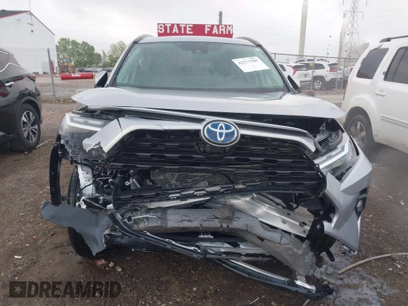 2024 Toyota RAV4 Hybrid XLE Premium z VIN 4T3B6RFV2RU151316, wystawiony jako IAAI lot #42171500 z przebiegiem 4 801 mil mil oraz . Historia ofert i sprzedaży dostępna na DreamBid. Obrazek 12.